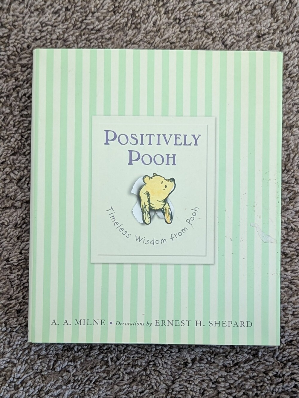 ​"Positively Pooh: Timeless Wisdom from Pooh" by A.A. Milne